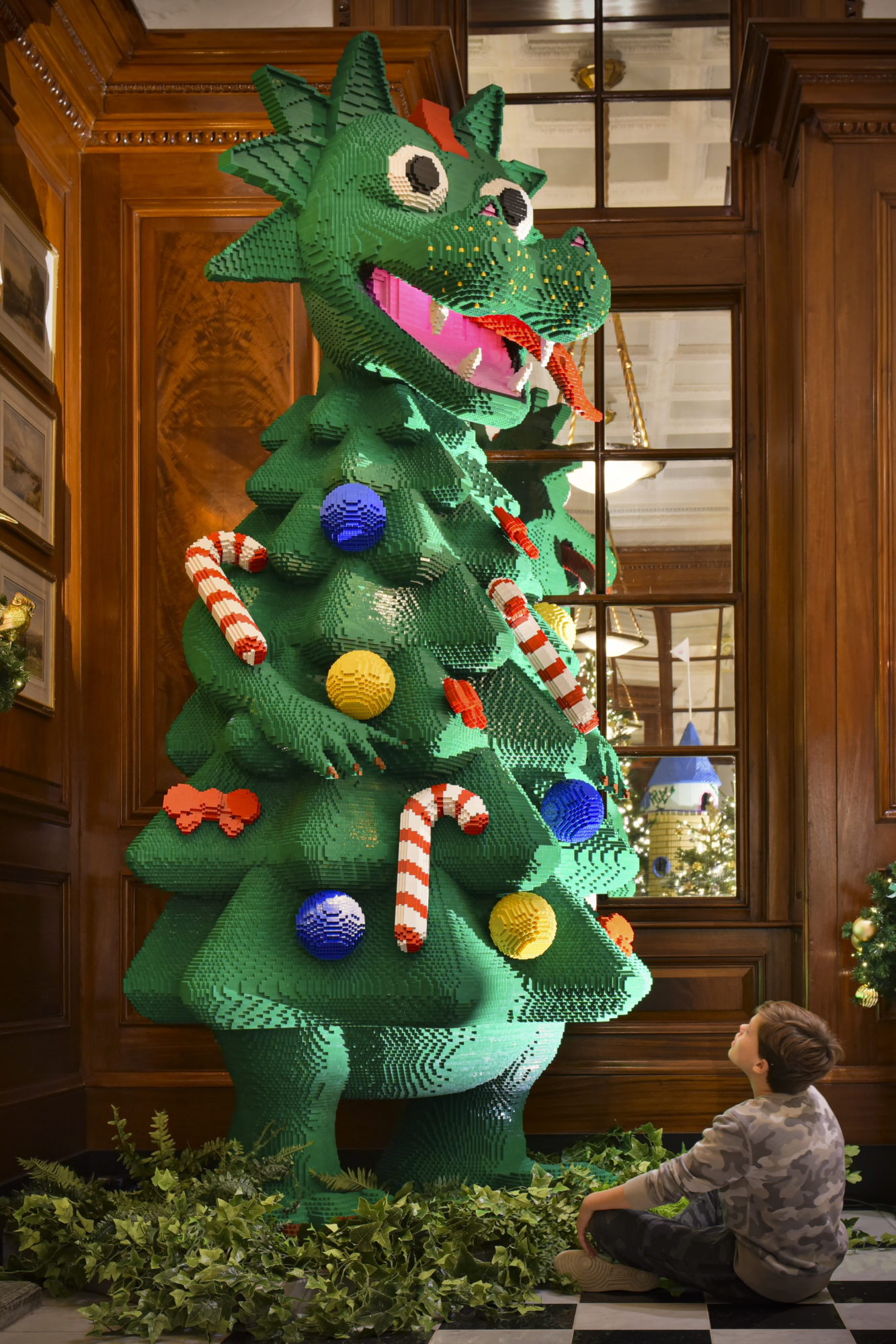 A Dragon-Shaped Christmas tree at the Savoy London part of The LEGO Group Twelve Rebuilds of Christmas takeover–jpg