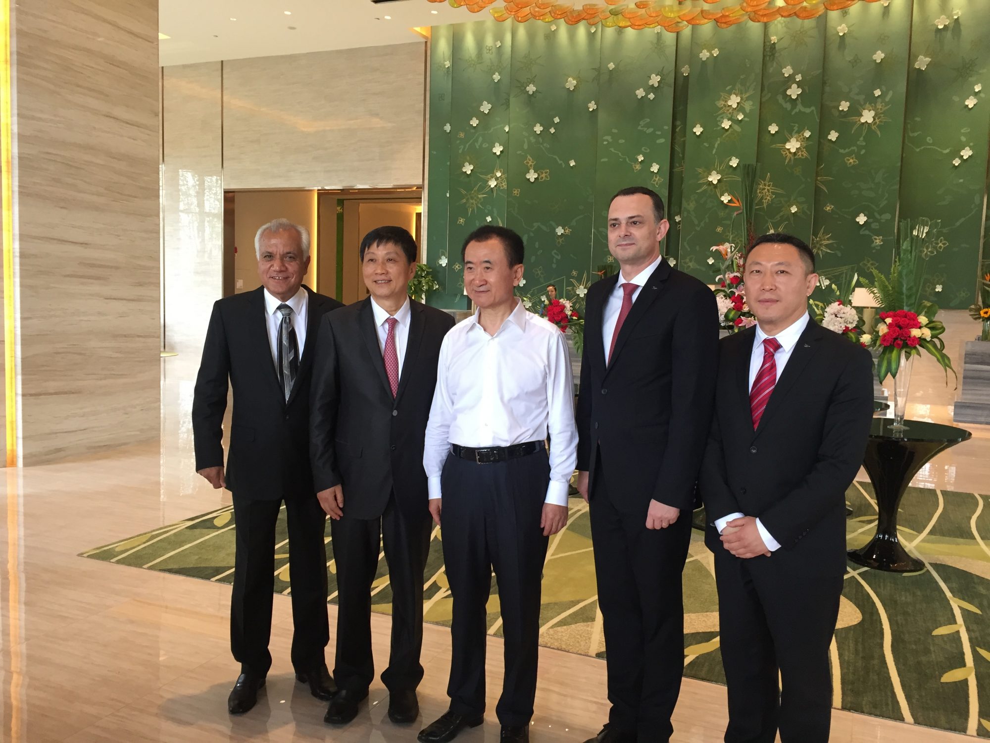 Mr. Maurice Cook, Mr. Qian Jin, Mr. WangJianlin, Mr. Christoph Lauras, Mr.Simon Tian(From Left to Right).JPG