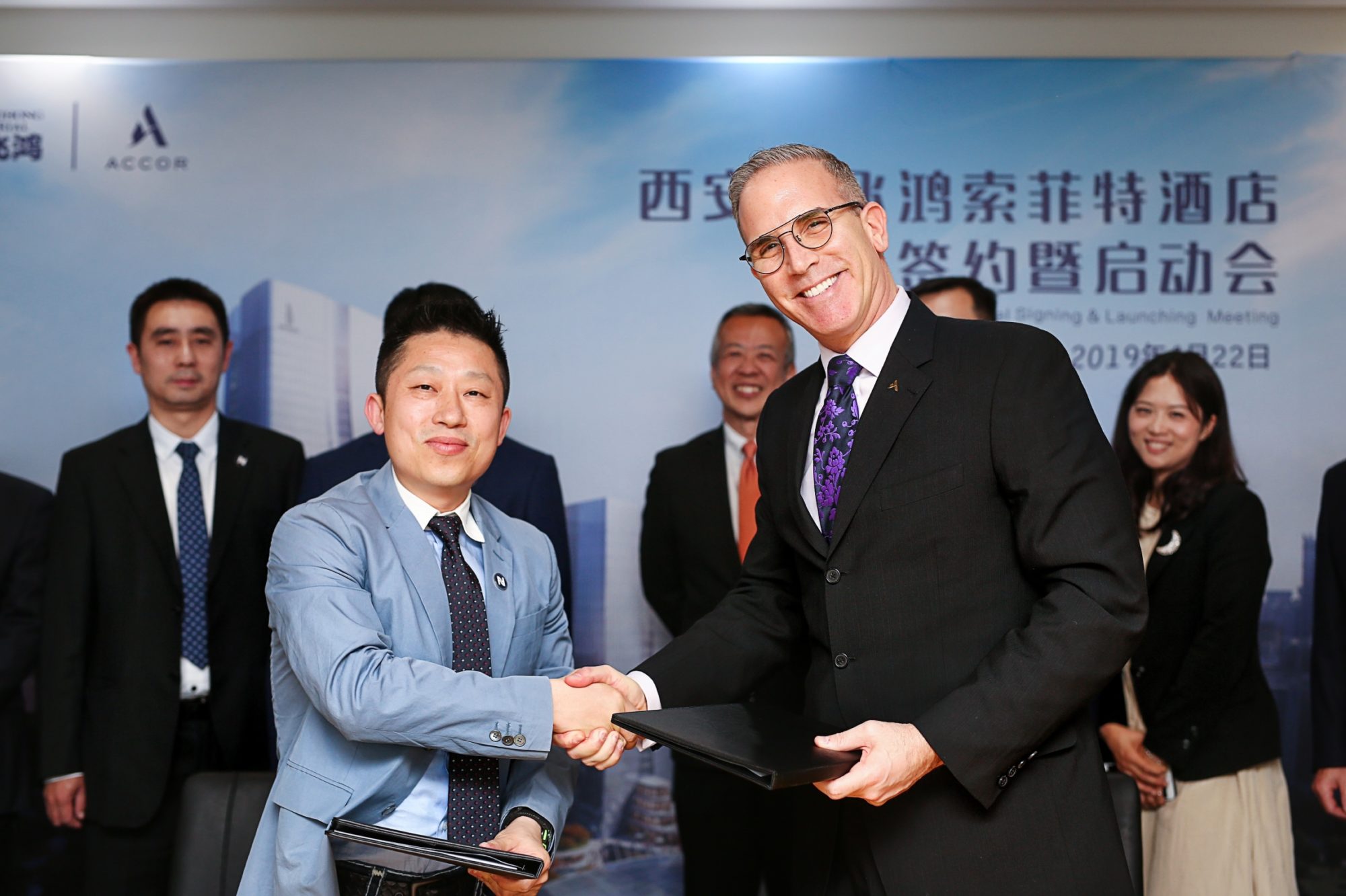 Luo Zhihong Chairman of Nanfeihong Industrial and Gary Rosen Chairman  COO Accor Greater China