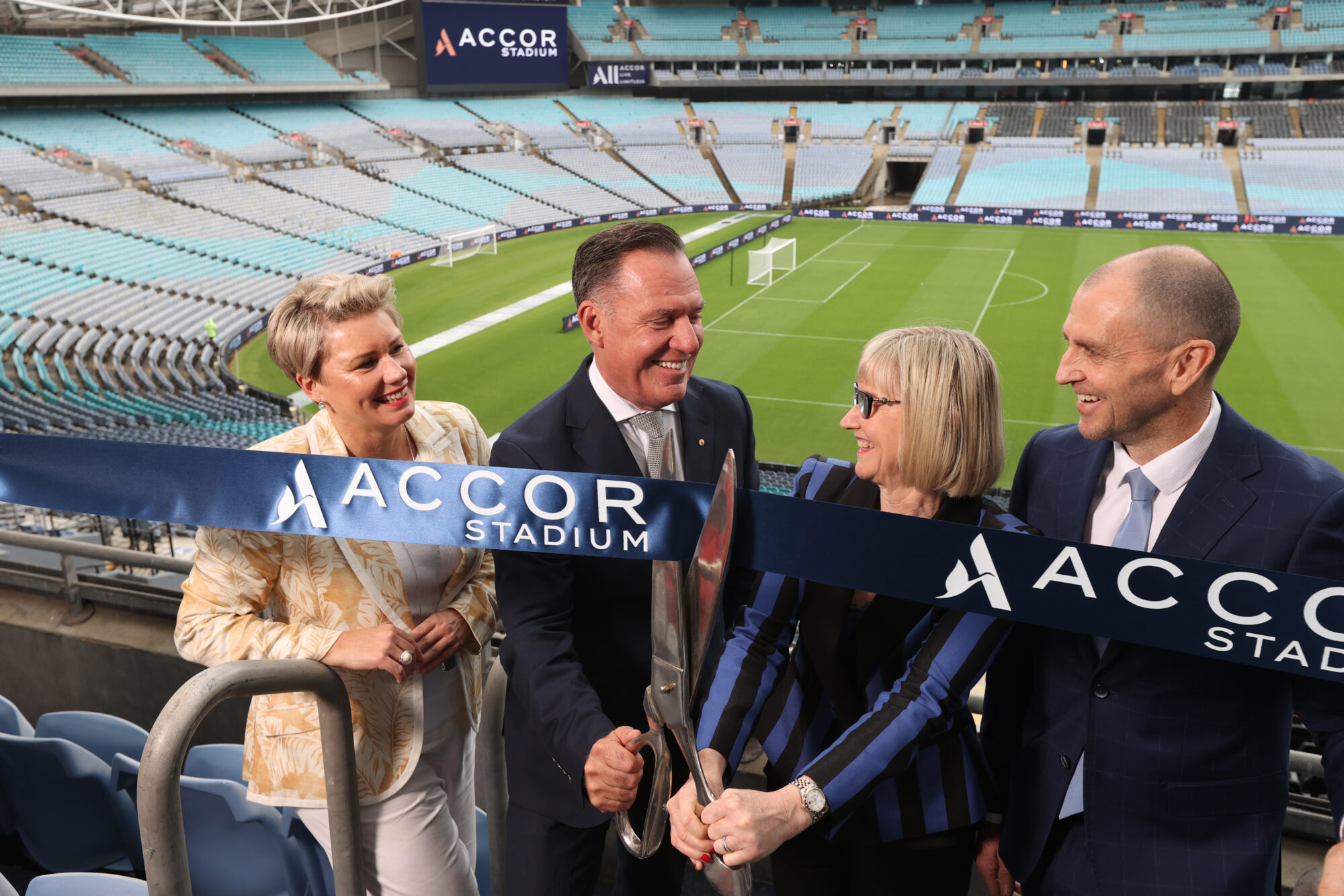 Accor Stadium Ribbon Cutting L-R Renae Trimble (Accor CCO), Simon McGrath (CEO), Kerrie Mather (Venues NSW CEO), and Daryl Kerry (Stadium Australia CEO).jpg